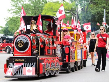 The train normally stationed in front of the cottage in Canatara Park is used during Sarnia's Canada Day parade on Friday. Terry Bridge/Sarnia Observer/Postmedia Network