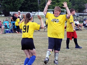 Sarnia Storm player Kian O'Keefe, 14, from Point Edward celebrates teammate Leah Chipman's goal against London during the Hometown Games soccer tournament Saturday at Corunna Athletic Park. Terry Bridge/Sarnia Observer/Postmedia Network