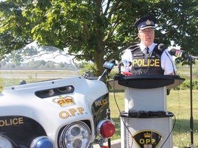 Insp. Shawn Johnson with the OPP West Region's traffic and marine unit speaks at the OPP's headquarters in London ahead of the Civic Holiday long weekend after the region has recorded nearly half of all fatal crashes involving motorcyclists so far this summer. (JONATHAN JUHA/The London Free Press)