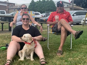 Lynn James (back left), Gerry James and Katelyn James (front) with their dog Spud at the dog contest held at Powell Park in Port Dover during the annual Canada Day Celebration.  ALEX HUNT