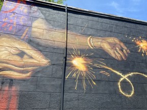 Part of the mural by artist Meaghan Kehoe in downtown Simcoe.  The work covers the side of the two-storey building at 18-20 Kent Street South and measures about 100-feet (almost 30-metres) in length.  SIMCOE REFORM