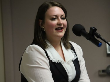 Kyla Heyming, Greater Sudbury's seventh and current poet laureate, performs at the Sudbury Workers Education and Advocacy Centre's Open Mic event at the main branch of the Greater Sudbury Public Library on Thursday.