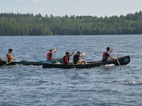 A party of canoeists from Camp Kilcoo, near Minden, set out across a choppy Panache Lake. The group was bound for Nellie Lake in Killarney Provincial Park. Jim Moodie/Sudbury Star