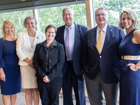 Science North representatives congratulate explorer Meagan McGrath, third from left, on being named an honorary life member of the centre. Pictured with McGrath are, from left, director of science Julie Moskalyk, interim CEO Jennifer Booth, board chair Stephen Kosar, former CEO Jim Marchbank, and director of development Ashley Larose.