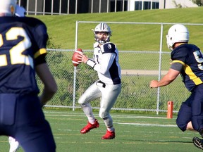Sudbury Spartans quarterback Adam Rocha (17) prepares to make a pass against the Sault Steelers at James Jerome Sports Complex in Sudbury, Ontario on Saturday, June 18, 2022. Ben Leeson/The Sudbury Star/Postmedia Network