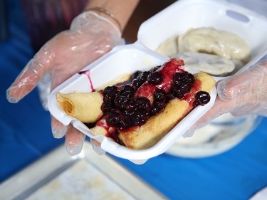 The Ukrainian Centre hosted a Blueberry Garden Party in Sudbury, Ont. on Thursday July 21, 2022. Food available included pyrohy, cabbage rolls, blueberry pyrohy, crepes with cream cheese filling and blueberry sauce, and a variety of blueberry desserts. John Lappa/Sudbury Star/Postmedia Network