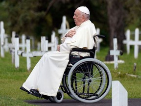 Pope Francis, the current head of the Catholic Church, prays at Ermineskin Cemetery in Maskwacis, Alberta on Monday July 25, 2022, his first stop on his tour of Canada which will also include Quebec and Nunavut. The pontiff delivered an apology for the Catholic Church's role in residential schools in Canada. LARRY WONG/POSTMEDIA
