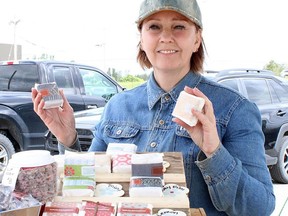 Joanna Scott of Stein Haven Farm in Ramore makes everything from moisturizers to Northern Ontario wool dryer balls.  Scott was among the vendors on the opening day of the Mountjoy Farmers Market.  NICOLE STOFFMAN/The Daily Press