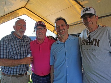 Fabrizio Fontana, from left, former director of manufacturing and engineering at General Motors. Jim Howie, former director of finance for the City of Timmins. Aldo Martin, former math teacher at TH&VS, and Wayne Brown, who "Married above my station," he said.

NICOLE STOFFMAN/The Daily Press