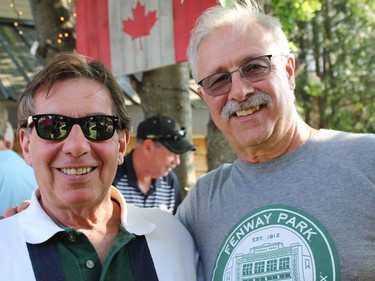 Joey Omiccioli, left, who travelled from North Bay for the reunion, is a former hockey player for the Italian National Hockey Team. Mike Charbonneau, right, is a Thériault grad and former commercial account manager at the Royal Bank. 

NICOLE STOFFMAN/The Daily Press
