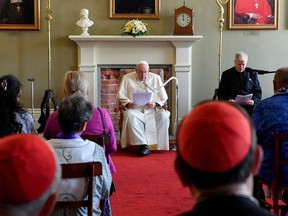 Pope Francis meets with a delegation of Indigenous Peoples at the Archbishop's residence in Quebec on Friday morning.

Vatican Media/Handout via REUTERS