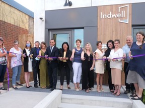 A ribbon-cutting at Dogwood Suites' grand opening last Thursday in Simcoe included Indwell staff, donors, and dignitaries.  CHRIS ABBOTT