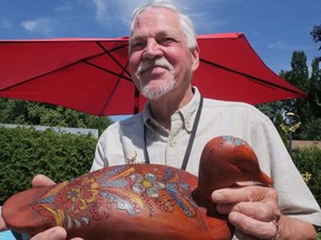 Joe Knauer was one of six local artists exhibiting in A Tour of Gardens in Tillsonburg Saturday.  Knauer's art is hard-carved and sculpted from wood.  CHRIS ABBOTT
