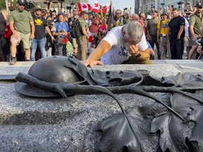 Canadian Forces veteran James Topp arrived at the National War Memorial early Thursday evening, completing a cross-country march to protest COVID-19 vaccine mandates, June 30, 2022.