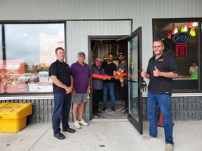 Councillors Rodney Hoogenhoud, Frank Sisco, Robert Huchinson and Mayor Denis Clement joined Vitul and Kunj Patel as they opened the newest restaurant in the community: Pita Pit.