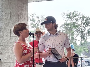 MP Karen Vecchio presented paralympian James Dunn with the Queen Elizabeth Platinum Jubilee Award in the category of Health Wellness, Activity, and Sport during the Canada Day celebration in West Elgin. Victoria Acres photo