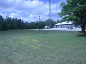 A grassy area just east of the Sauble Beach Community Centre building that has been identified as a possible off-leash dog park in the community.