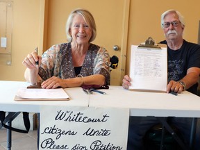 Lynne and Don Connell sought signatures for their petition at IGA. Lynne Connell started the petition calling on the Alberta legislature to mark the Whitecourt Healthcare Centre as “high priority for complete replacement.”