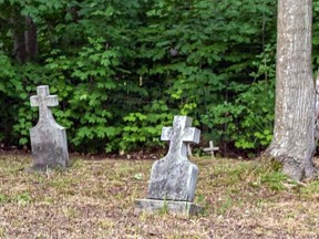 St. Aloysius Cemetery is tucked behind the former St. Aloysius Church, on Pinder Drive, which closed in 2006 and was sold two years later. Marguerite La Haye