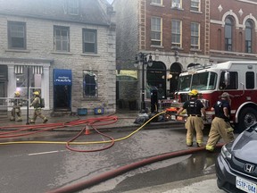 Kingston Fire and Rescue firefighters respond to a fire at the downtown boutique Modern Primitive in the early morning of Aug. 4.