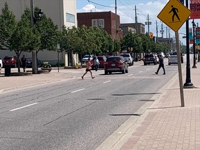 Pedestrians dodge traffic as they cross Oak Street to head to the waterfront. Coun. Dave Mendicino garnered support Tuesday to have city staff look at options and present them to the next council in the 2023 budget.

Jennifer Hamilton-McCharles, The Nugget
