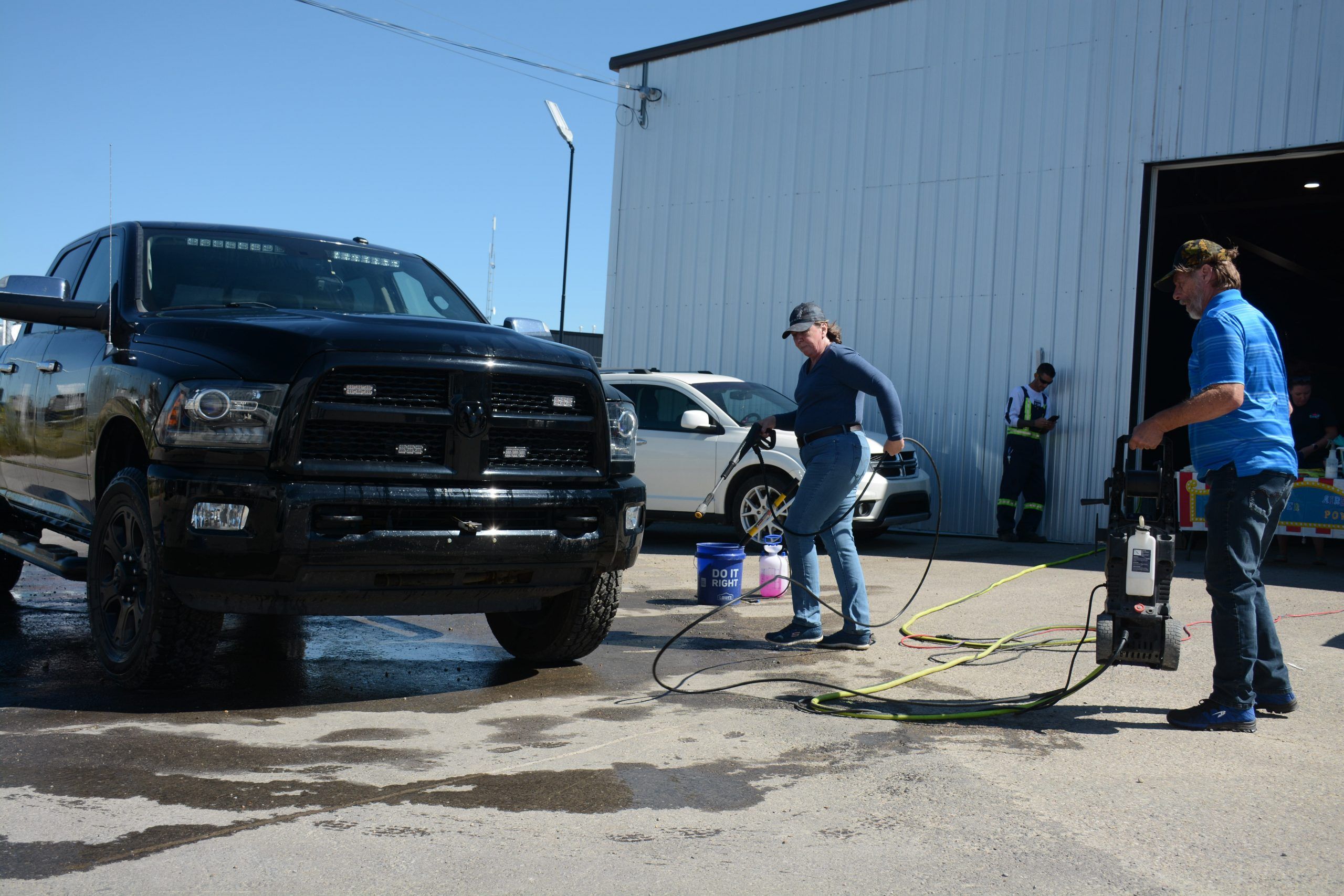 Empire Details hosts carwash fundraiser Airdrie Echo