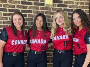 Claira Stone (from left to Right), Danna Juarez, Mattea Burrill and Jessie Schmidt take a group photo during their trip to Delaware. The four were a part of Team Canada at the Senior Softball Little League World Series. Photo courtesy of Jasmine Stone.