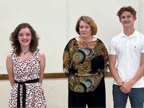Point Edward residents Adrianna King (left) and Liam Fogel (right) picked up the 2022 Maynard and Rene Walker Family scholarships from Mary Ellen Walker (centre) on Aug. 3 at the Point Edward Community Hall.
Handout/Sarnia This Week
