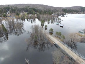 This was Doe Lake in 2019 after severe flooding. The rooftops on the right are part of the Doe Lake Municipal Park. Mayor Bob MacPhail says flooding on Doe Lake is a relatively new situation and believes logs at the nearby Watt's Dam are a major reason for the high levels. Katrine residents are meeting with the Ministry of Natural Resources and Forestry on Aug. 18 to understand why water levels on Doe Lake are higher than the levels of other nearby lakes.