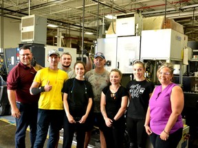 Within the last month, Stratford's Stackpole International auto-parts plant has brought over 10 Ukrainian refugees from its sister plant in Poland and helped resettle them with housing, language and other support services in the city and surrounding area. Pictured from left are Stackpole environmental health and safety specialist Scott Herman, Stackpole employees and housemates Mykhailo Komeranko, Oleksandr Buzenko, Mariana Vatamaniuk, Vladyslav Kucherenko, Alina Pianychuk and Valentyna Buzenko, and Stackpole human resources director Tara Ross. (Galen Simmons/The Beacon Herald)