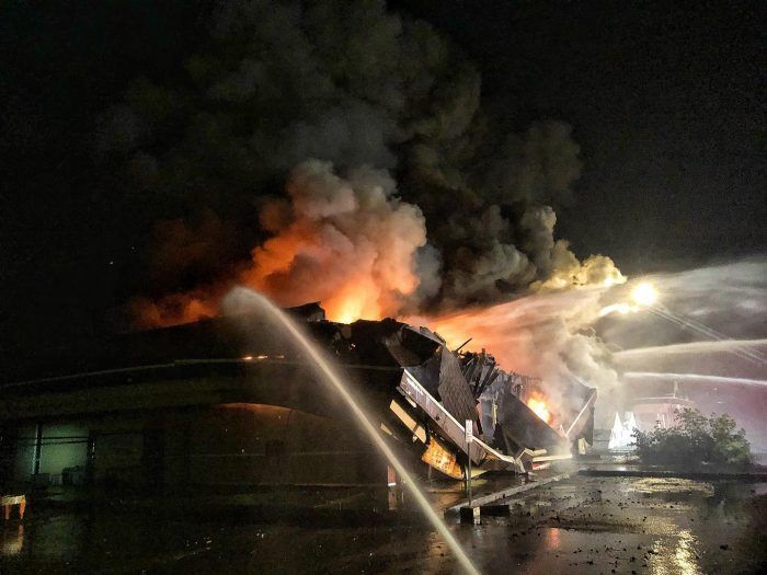 County fire crews assists in Fort commercial blaze, arson suspect