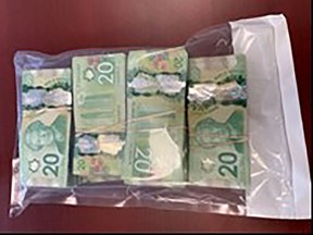 A large amount of cash recovered by RCMP. (supplied photo)