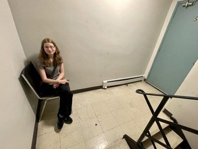 Amber Rankine sits on a chair in the fifth floor of her building at 470 Dundas St. that for the past six weeks had been without a working elevator following the strike of TSSA inspectors. (JONATHAN JUHA/The London Free Press)