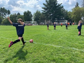 Paisley St. Jean makes a great kick to her teammates during Saturday's North Bay Youth Soccer Jamboree at the ONR field. More than 700 kids played soccer this summer.