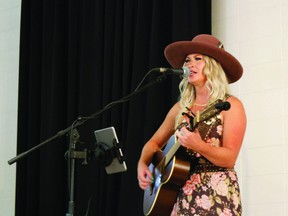 Lyndsay Butler, local Albertan musician, performed live music at the Western Market on August 20.