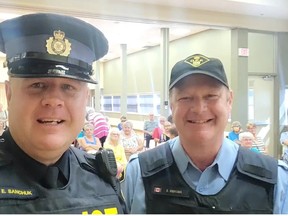 Norfolk OPP Const.  Ed Sanchuk, left,  and Auxiliary Sergeant Brad Wiersma gave a “fight fraud” presentation recently at the Simcoe Seniors Centre. The presentation covered various topics such as types of scams, thefts, and how to spot fraud.