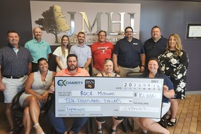 ROCK Missions received $10,000 as one of two recipients from the CK Charity Classic golf tournament.  Shown in the back row are Eric Goudreau, Eric Koscielski, Ashley Wilton, Elliot Wilton, Jeff Comiskey, Adam Dickinson, Andrew Theil and Lori Phillips.  In the front row are Catie Hawryluk, BJ Griffiths, Renee Geniole and Erin Dickinson.  (Handout/Postmedia Network)