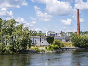 The former Sonoco paper mill in Glen Miller, now owned by All Season Fencing, sits beside the Trent River on Wednesday afternoon in Quinte West, Ontario. ALEX FILIPE