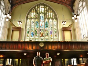 Restoration work started this week on the large, front stained-glass window at Copperlight, formerly Knox Presbyterian Church in dowtown Stratford. Pictured, Paul Veldman, managing partner of BMI Group - the new owner of Copperlight - and Copperlight general manager Leonard Stannard stand in front of the stained-glass window before work was set to begin on Tuesday. (Galen Simmons/The Beacon Herald)