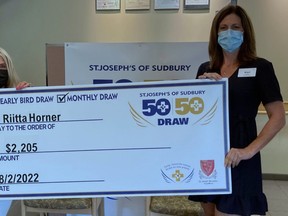 Riita Horner, left, accepts a cheque for $2,205 from Kari Gervais, CEO of St. Joseph’s Health Centre, in early August after winning the St. Joseph’s monthly draw for July. The next draw ends Aug. 31. Tickets can be purchased online at stjoessudbury5050.ca. Proceeds from the draw will go toward construction a new 36-bed, inpatient rehabilitation facility.