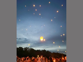 A 22-year-old Brampton woman — who prefers to remain anonymous — took this photo of flame-powered lanterns floating into the night sky at an unsanctioned lantern festival  held on a Six Nations of the Grand River farm.