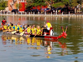 One of the 18 teams that participated in the Sydenham Challenge Dragon Boat Festival in Wallaceburg on Aug. 20 drives towards the finish line. Ellwood Shreve/Postmedia