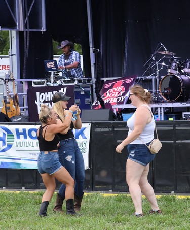 DJ Johnny Rivex warmed up the crowd at Music in the Fields on Aug. 25. Photo by Kelly Kenny/Lucknow Sentinel.