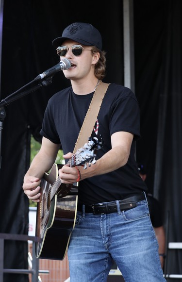 The crowd went wild chanting for Mildmay talent and emerging artist competition runner up Owen Riegling to hit the stage a second time at Lucknow's Music in the Fields on Aug. 27. Photo by Kelly Kenny/Lucknow Sentinel.