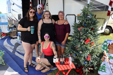 Campers at Lucknow's Music in the Fields decorated their sites in various styles, including this holiday theme. L to R: Shaunna Smith, Steven Bender, Sommer Bender, Grace Bender. Front: Steph Hamilton. Photo by Kelly Kenny/Lucknow Sentinel.