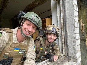 Searle with one of his emergency aid partners in Ukraine.