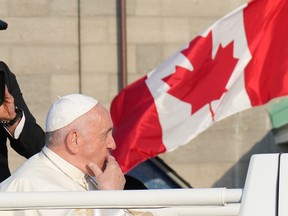 Pope Francis leaves the Citadelle in the popemobile following a reconciliation ceremony during his papal visit across Canada in Quebec City on Wednesday, July 27, 2022. Pope Francis says he felt the pain of Indigenous Peoples during his trip to Canada but also left with a sense of hope. THE CANADIAN PRESS/Nathan Denette
