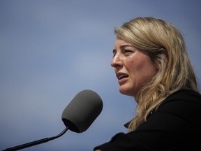 Minister of Foreign Affairs Melanie Joly speaks during a press conference in Toronto on August 5, 2022. Canada has sanctioned a Russian woman whom the foreign affairs minister's office alleges is the architect of a scheme to abduct Ukrainian children and facilitate their adoption into Russian homes. THE CANADIAN PRESS/Cole Burston