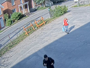 Two of the three suspects sought by Kingston Police in a break and enter on Princess Street in June are seen in this security video.