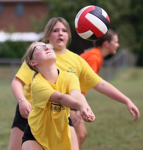 Ruby Garneau returns as Sydney Phillips looks on during the annual Kent Volleyball Camps at the Chatham Campus HealthPlex at St. Clair College in Chatham, Ont., Friday, August 5, 2022. Mark Malone/Chatham Daily News/Postmedia Network